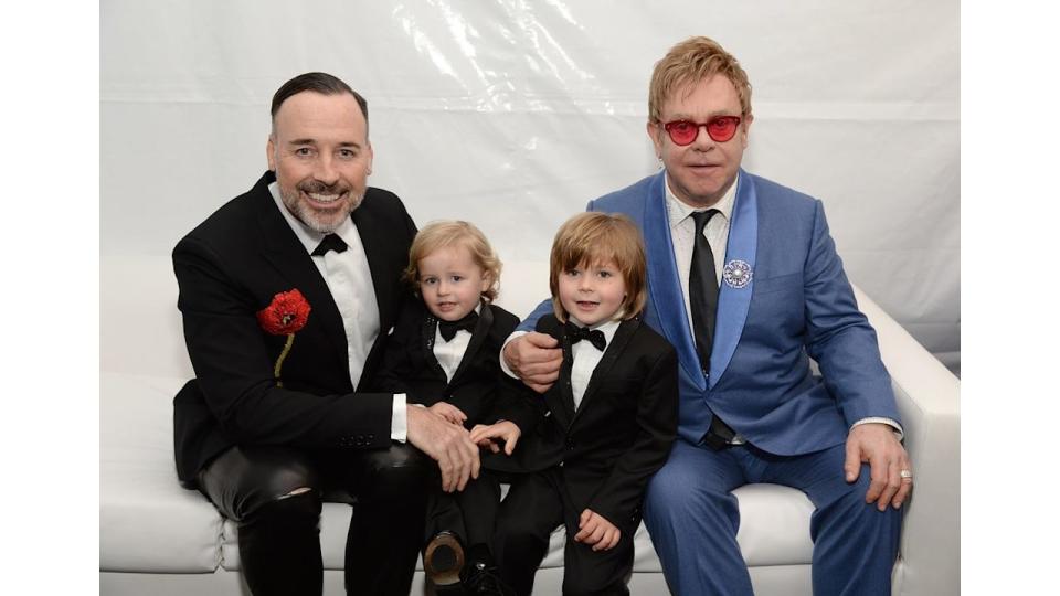 Elton John’s sons Zachary and Elijah look so grown up in new holiday video