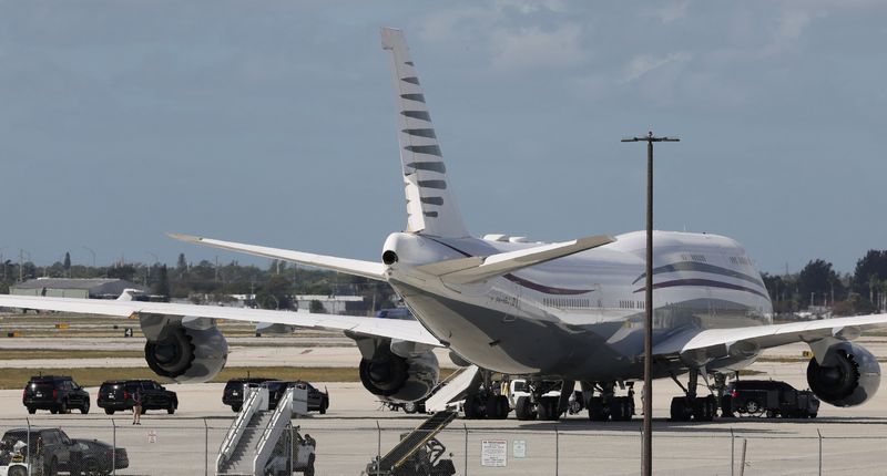 Trump tours a Boeing plane to spotlight delay on getting new Air Force One