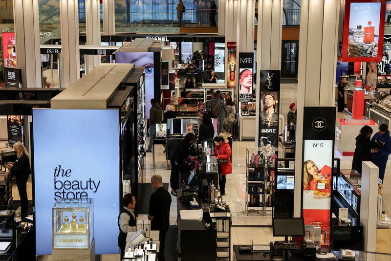 US consumer spending falls in January; monthly inflation rises